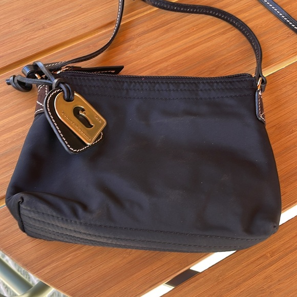 Dooney and Bourke nylon mini crossbody bag with leather strap - Picture 7 of 8